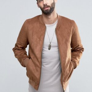 A man wearing a Quilted Sleeve In Tan bomber jacket.